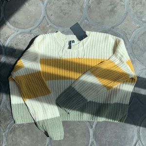 Cropped, striped and knit sweater